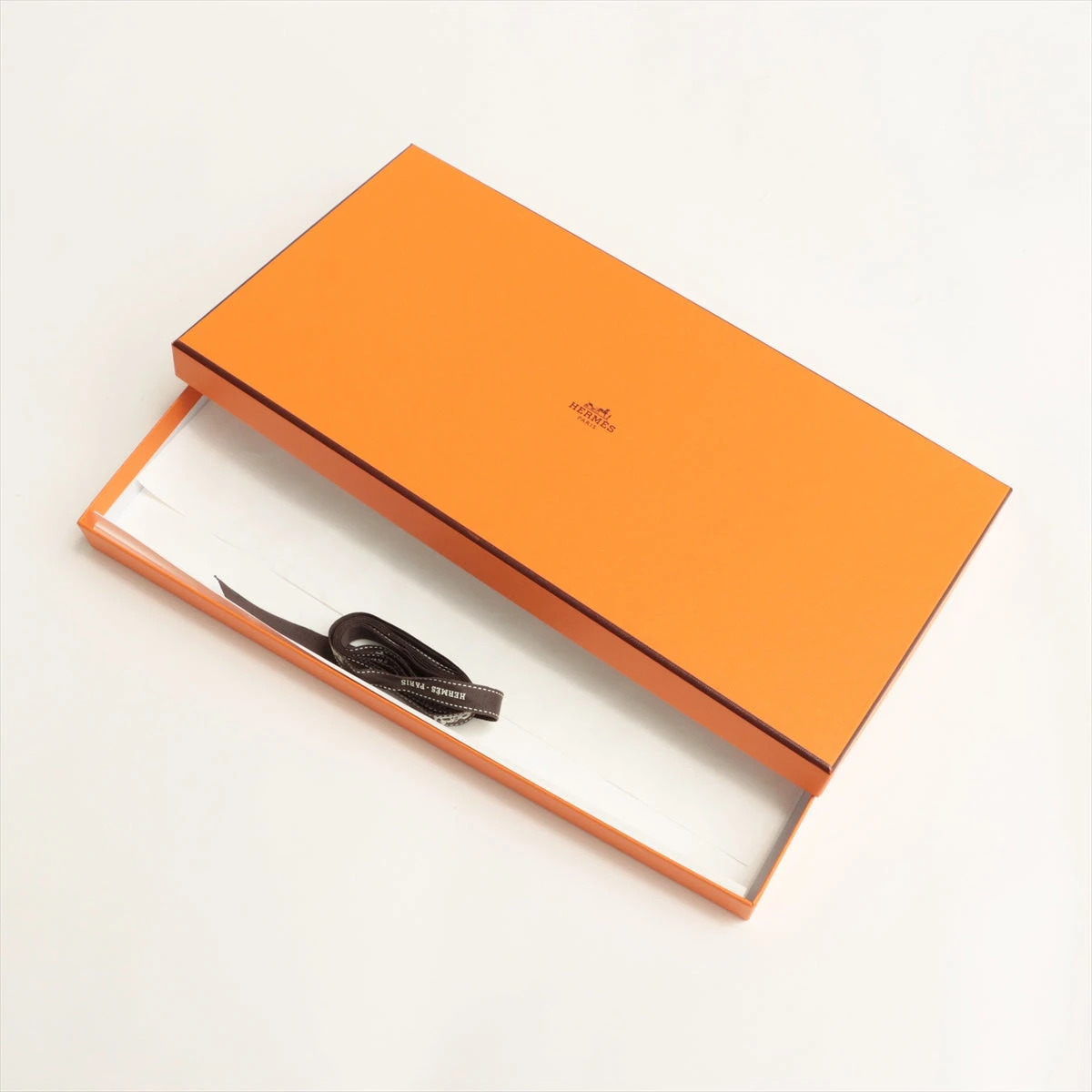 エルメス　ツイリー　グランテアトルヌーヴォー　オレンジ　シルク　スカーフ Twilly 《グラン・テアトル・ヌーヴォー》 - オレンジ | Hermès