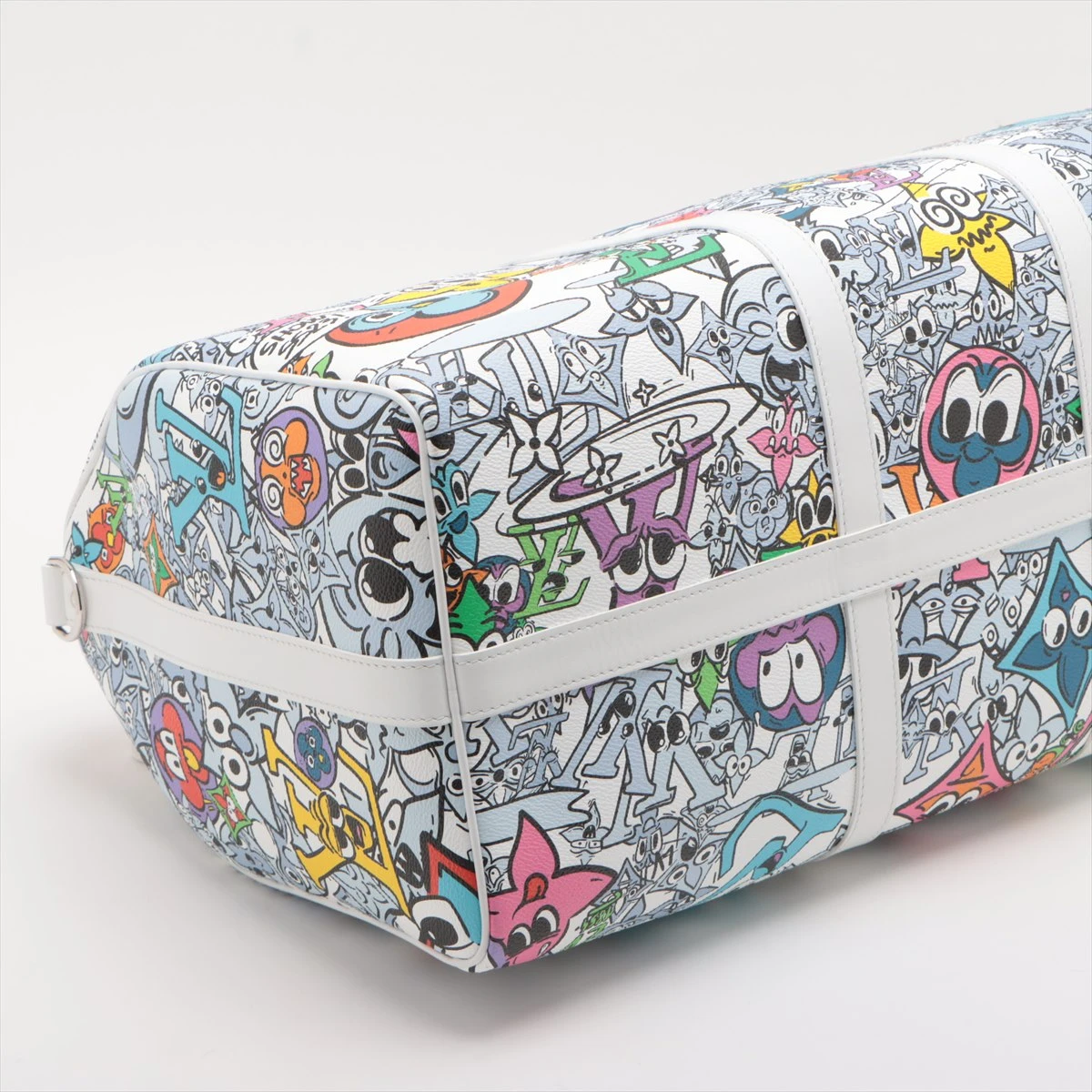 ヴィトン モノグラム コミック キーポル バンドリエール50