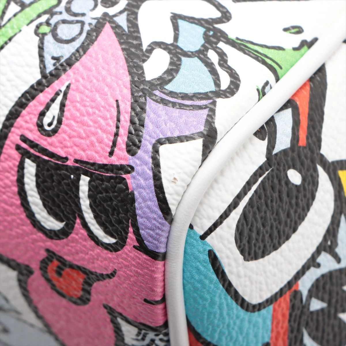 ヴィトン モノグラム コミック キーポル バンドリエール50