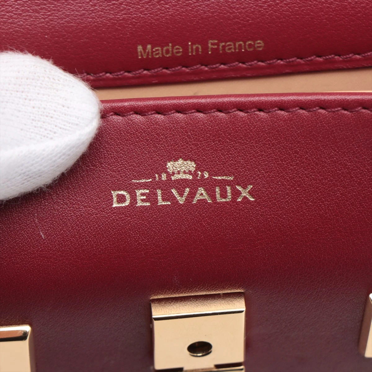 デルボー タンペートスモール レザー 2WAYハンドバッグ ボルドー