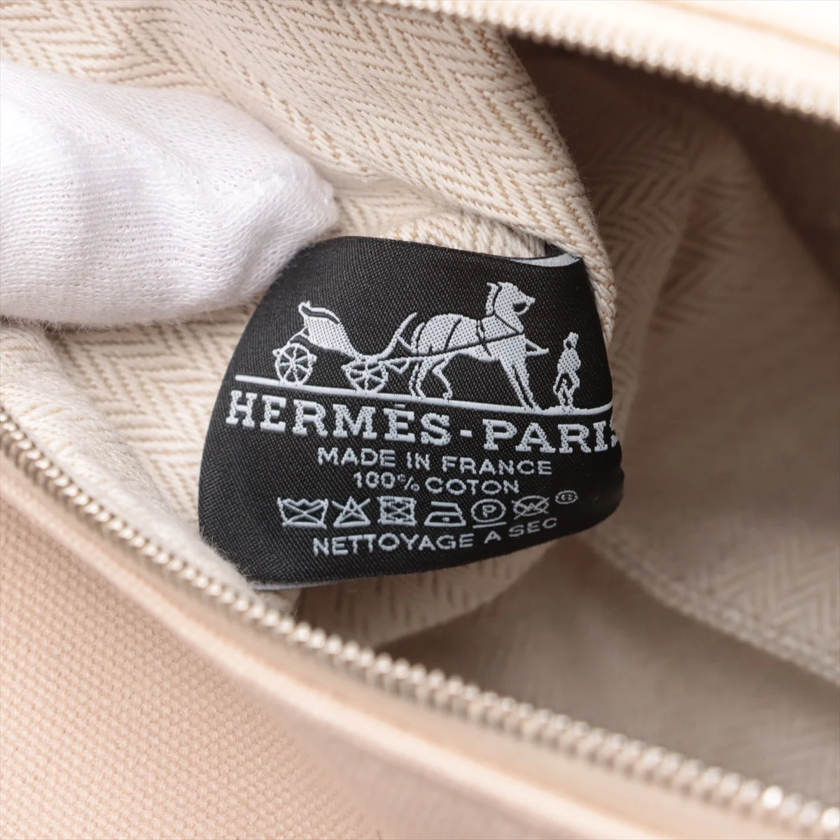 並行輸入品ベージュキャンバスポーチ ハンドル付き　ブリッドアブラック HERMES エルメス ポーチ ブリッドアブラック PM ジグザグ