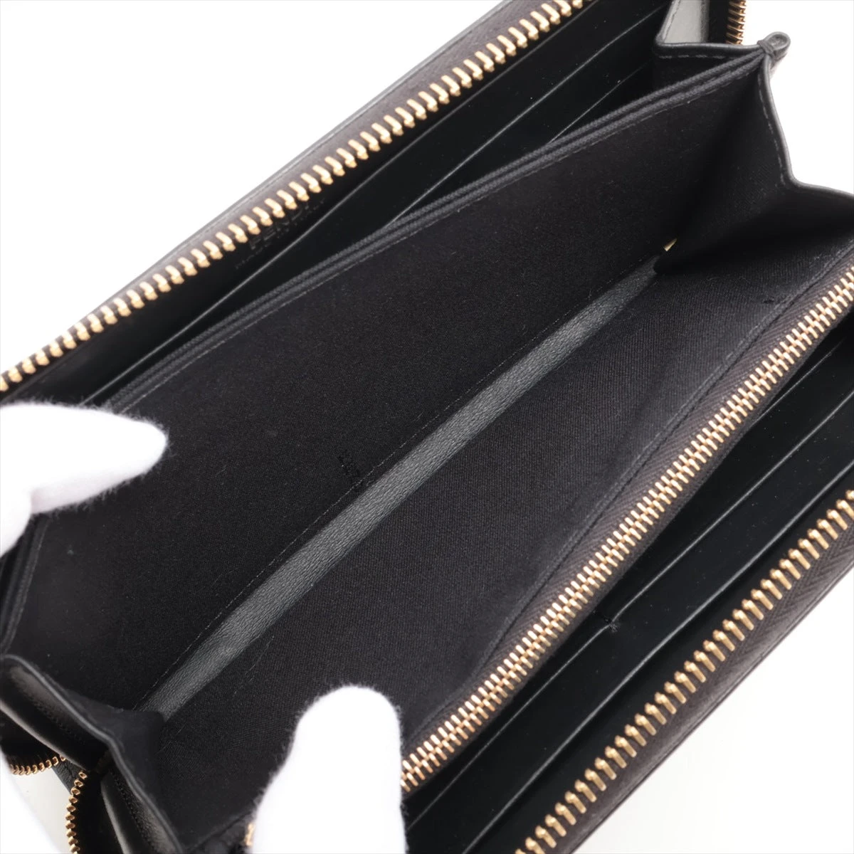 フェンディ モンスターアイ 7M0210 レザー ラウンドジップ