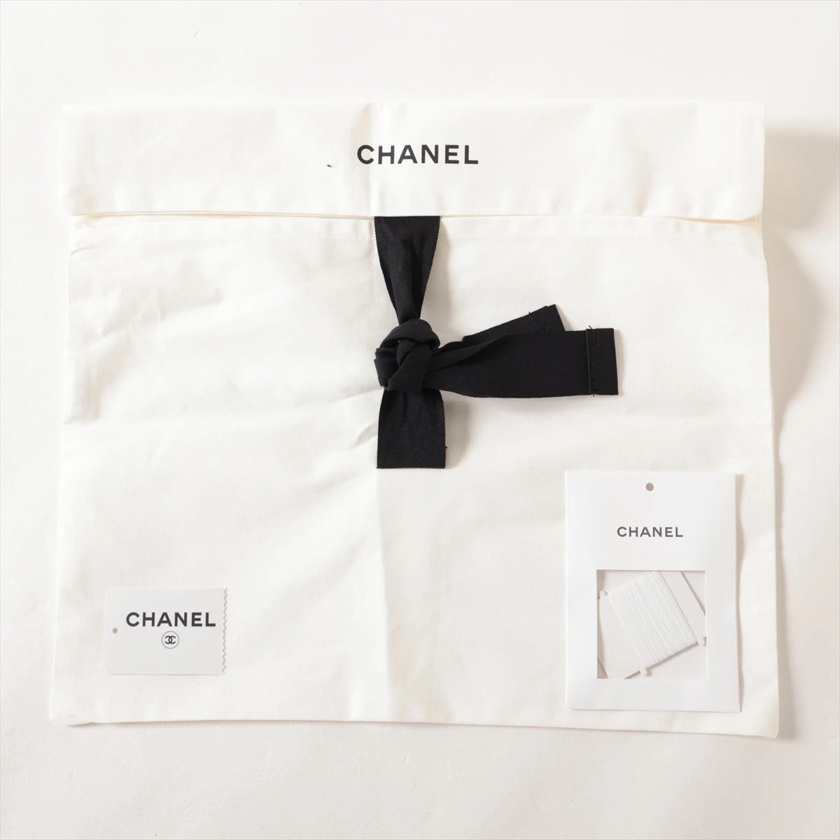 シャネル　ロゴプレート　リボンチェーンカットソー#38 シャネル ロゴプレート リボンチェーンカットソー#38