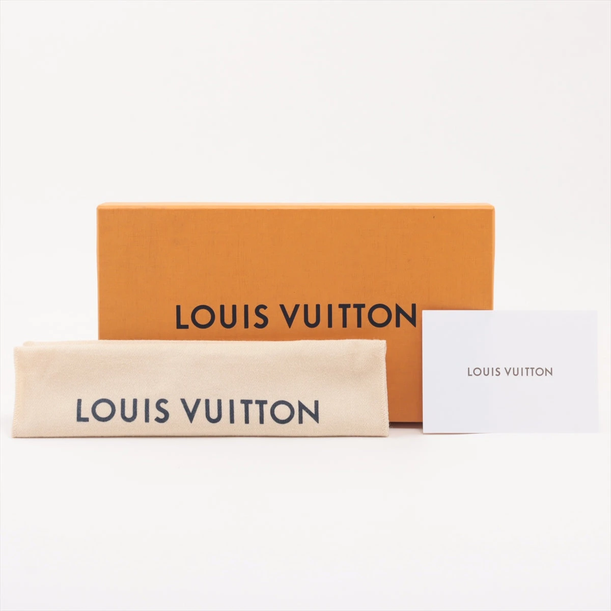 ヴィトン トリヨン LV ヴェルティカル ウォレット カプシーヌ M81330 