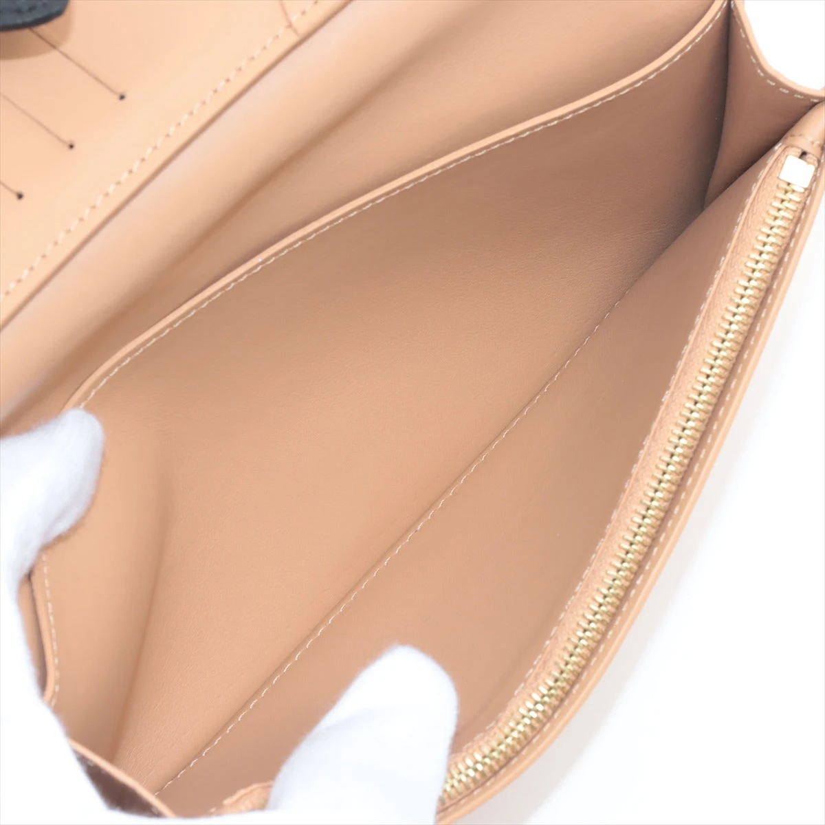 ヴィトン トリヨン LV ヴェルティカル ウォレット カプシーヌ