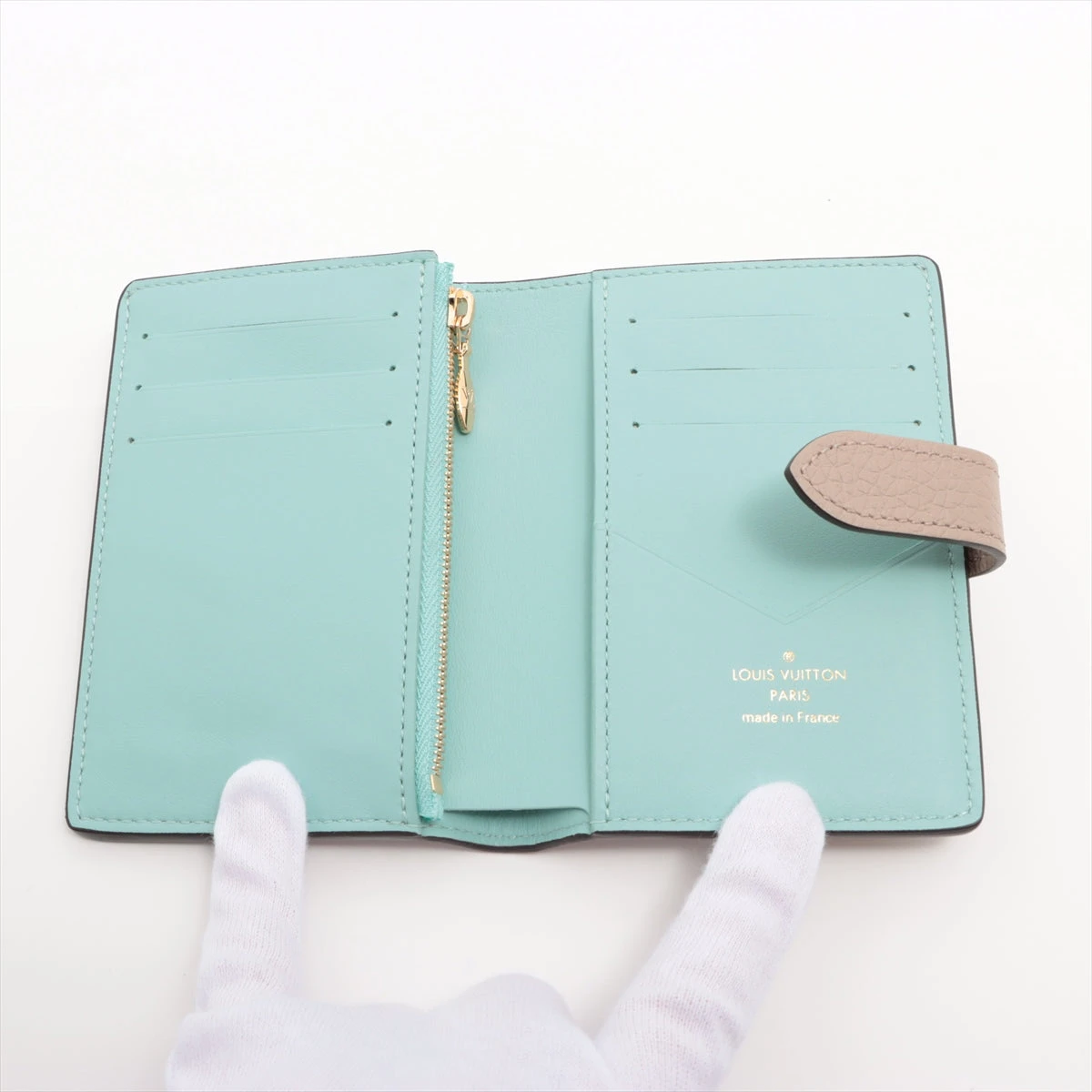 ヴィトン トリヨン LV ヴェルティカル ウォレット カプシーヌ